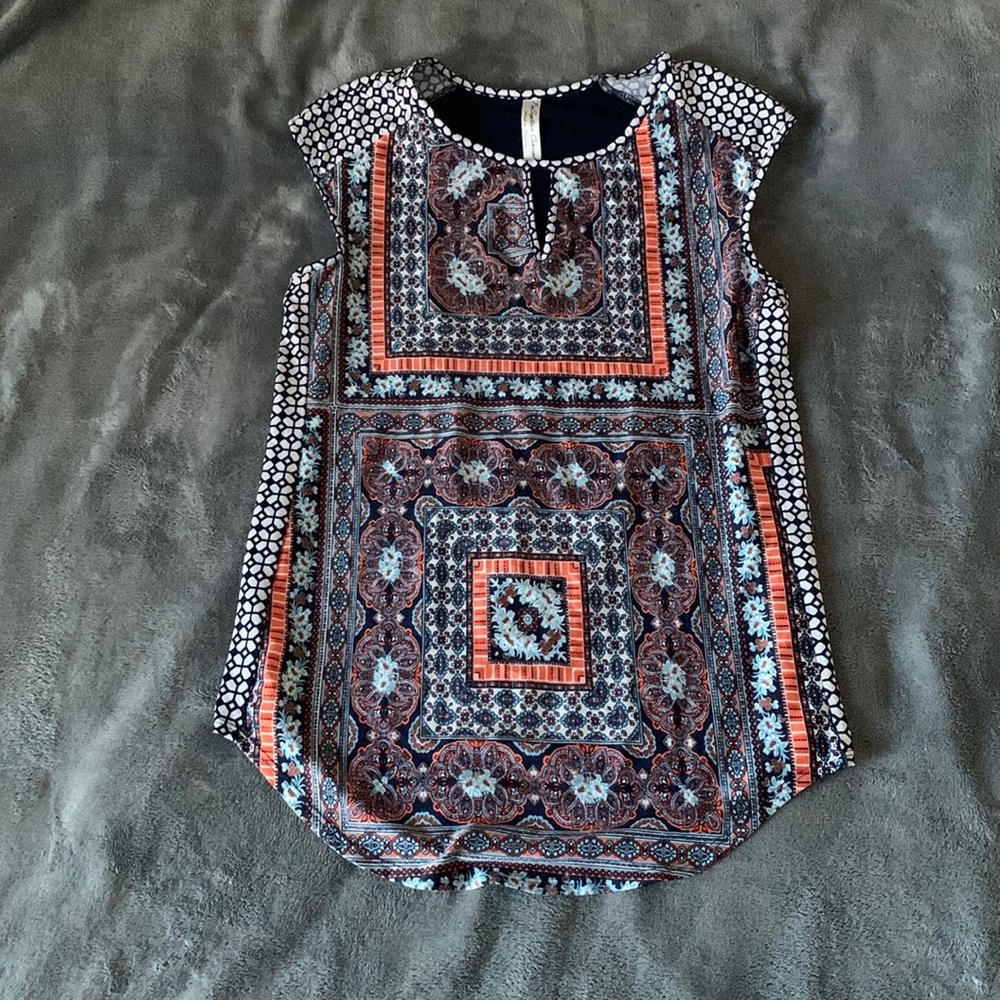 This small PerSeption Concept women’s shirt is only $6!